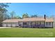 Charming single-story home with a welcoming front porch and well-maintained lawn, highlighting its curb appeal and inviting atmosphere at 4487 Catawba Burris Rd, Denver, NC 28037