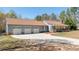 Spacious three-car garage with a long driveway, providing ample parking and storage space at 4487 Catawba Burris Rd, Denver, NC 28037