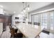 Open kitchen with a large island, stainless steel appliances, breakfast bar, and access to the backyard at 4487 Catawba Burris Rd, Denver, NC 28037