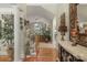 Inviting foyer with hardwood floors, elegant staircase, and decorative accents at 4586 Chanel Ct, Concord, NC 28025