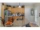 Kitchen island with granite countertop, stainless steel sink, and ample cabinet space at 4586 Chanel Ct, Concord, NC 28025
