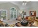 Bright living room with vaulted ceilings, lots of natural light, and comfortable seating at 4586 Chanel Ct, Concord, NC 28025