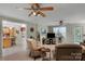 Inviting living room area with abundant natural light and ceiling fans for optimal comfort at 4586 Chanel Ct, Concord, NC 28025