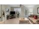 Cozy living room with plush seating, bright window and convenient access to the outdoors at 4586 Chanel Ct, Concord, NC 28025