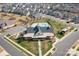 Aerial shot showcasing the community clubhouse, pool, playground, and surrounding homes in a residential neighborhood at 5025 Antebellum Dr, Iron Station, NC 28080