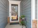Close-up of a porch featuring a decorative door and outdoor decor at 5025 Antebellum Dr, Iron Station, NC 28080