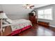 Cozy bedroom with ceiling fan, hardwood floors, and dresser at 514 Baucom Deese Rd, Monroe, NC 28110