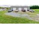 Spacious three-car garage with driveway parking and lush green lawn at 514 Baucom Deese Rd, Monroe, NC 28110