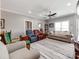 Comfortable living room with hardwood floors, a ceiling fan, and views of adjacent rooms at 514 Baucom Deese Rd, Monroe, NC 28110