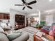 Spacious living area with hardwood floors, open to the dining area, and a decorative ceiling fan at 514 Baucom Deese Rd, Monroe, NC 28110
