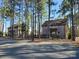 Community amenities featuring rustic-style wooden exteriors and well-maintained landscaping at 525 Cellini Pl, Mount Holly, NC 28120