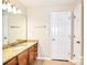 Bathroom features granite countertops, vanity, and white cabinets at 5344 Saddlewood Ln, Mint Hill, NC 28227