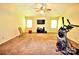 Spacious bonus room includes workout equipment and entertainment area at 5344 Saddlewood Ln, Mint Hill, NC 28227