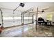 Spacious three-car garage with ample storage space at 5344 Saddlewood Ln, Mint Hill, NC 28227