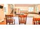 Open-concept kitchen boasts granite countertops, stainless steel appliances, and a breakfast bar at 5344 Saddlewood Ln, Mint Hill, NC 28227