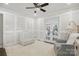 Charming Bedroom with white crib, chair, and decor accents and view to a second room at 5400 Glenham Dr, Charlotte, NC 28210
