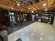 Garage space equipped with a home gym, showcasing painted floors and paneled walls at 5400 Glenham Dr, Charlotte, NC 28210