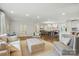 Spacious living room with open floor plan to the dining and kitchen areas at 5400 Glenham Dr, Charlotte, NC 28210