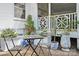 Inviting patio features a cozy seating area perfect for outdoor relaxation at 5400 Glenham Dr, Charlotte, NC 28210