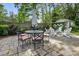 Outdoor patio features both dining and lounge seating with manicured landscaping at 5400 Glenham Dr, Charlotte, NC 28210