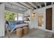 Relaxing porch featuring a daybed with cozy pillows and a blanket at 5400 Glenham Dr, Charlotte, NC 28210