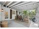 Inviting screened porch with a dining area and comfortable seating, perfect for outdoor enjoyment at 5400 Glenham Dr, Charlotte, NC 28210