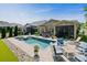 Enjoy the beautiful backyard featuring a sparkling pool, a spa, and ample outdoor seating at 650 Tallulah Falls Dr, Denver, NC 28037