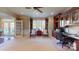 Bright office space with built-in cabinetry, a ceiling fan, and a large window providing natural light at 708 Ridgelake Dr, Weddington, NC 28104