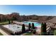 Community pool featuring a kiddie splash area with covered lounge, perfect for Gathering fun at 708 Ridgelake Dr, Weddington, NC 28104