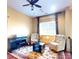 Relaxing sitting area features a window seat, piano, arm chairs, and natural light at 708 Ridgelake Dr, Weddington, NC 28104
