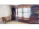 Sitting area with built-in shelves, cabinets, window seat, and desk at 708 Ridgelake Dr, Weddington, NC 28104