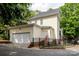 Well-maintained home featuring a two-car garage and a fenced backyard, ideal for outdoor activities at 734 E 10Th St, Charlotte, NC 28202