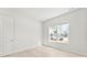This bedroom features a large window that brings in plenty of natural light at 7500 Happy Hollow Dr, Mint Hill, NC 28227