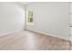 Bright bedroom featuring a window that brings in natural light at 7500 Happy Hollow Dr, Mint Hill, NC 28227
