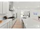 Bright modern kitchen with stainless steel appliances and sleek countertops at 7500 Happy Hollow Dr, Mint Hill, NC 28227