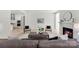 Spacious living room showcasing an open layout, fireplace, and contemporary decor at 7500 Happy Hollow Dr, Mint Hill, NC 28227