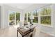 Bright home office with views of outdoor living space and backyard, ample natural light at 7500 Happy Hollow Dr, Mint Hill, NC 28227