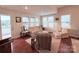 Bright living room with comfortable seating and great natural light at 7581 Short Putt Ct, Charlotte, NC 28215