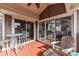Inviting patio with outdoor seating and sliding glass doors leading inside at 7844 Village Harbor Dr, Cornelius, NC 28031