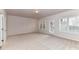 Bedroom featuring natural light, neutral carpet and white trim at 7854 Springs Village Ln, Charlotte, NC 28226