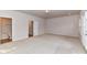 Spacious bedroom features neutral carpet, a ceiling light, and access to the adjoining bathroom at 7854 Springs Village Ln, Charlotte, NC 28226