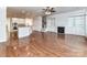 Bright and airy living room with fireplace, built-in shelves and hardwood floors at 7854 Springs Village Ln, Charlotte, NC 28226