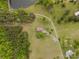 Secluded property featuring trees, long driveway, green lawns and a private home setting at 807 And 809 Sparrow Springs Rd, Kings Mountain, NC 28086