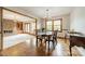 Formal dining room featuring beautiful hardwood floors, wainscoting, and large windows at 807 And 809 Sparrow Springs Rd, Kings Mountain, NC 28086