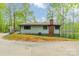 Exterior view of a home featuring a brick chimney, manicured lawn, and driveway at 807 And 809 Sparrow Springs Rd, Kings Mountain, NC 28086