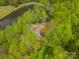 Aerial view of a charming home nestled within a forest, offering both privacy and natural beauty at 807 And 809 Sparrow Springs Rd, Kings Mountain, NC 28086