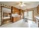 Eat-in kitchen features tiled floor and backsplash, light wood cabinets, and stainless steel appliances at 807 And 809 Sparrow Springs Rd, Kings Mountain, NC 28086