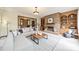 Cozy living room featuring neutral tones, a fireplace, and built-in shelving at 807 And 809 Sparrow Springs Rd, Kings Mountain, NC 28086