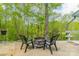 Outdoor patio area with comfortable seating around a unique fire pit at 807 And 809 Sparrow Springs Rd, Kings Mountain, NC 28086