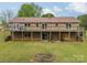 Spacious backyard featuring a brick home with a raised deck perfect for outdoor living at 807 And 809 Sparrow Springs Rd, Kings Mountain, NC 28086